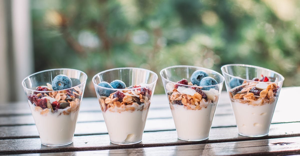 Making drinkable yogurt - Creamy Grains With Blueberries in Clear Cups Making drinkable yogurt - Creamy Grains With Blueberries in Clear Cups