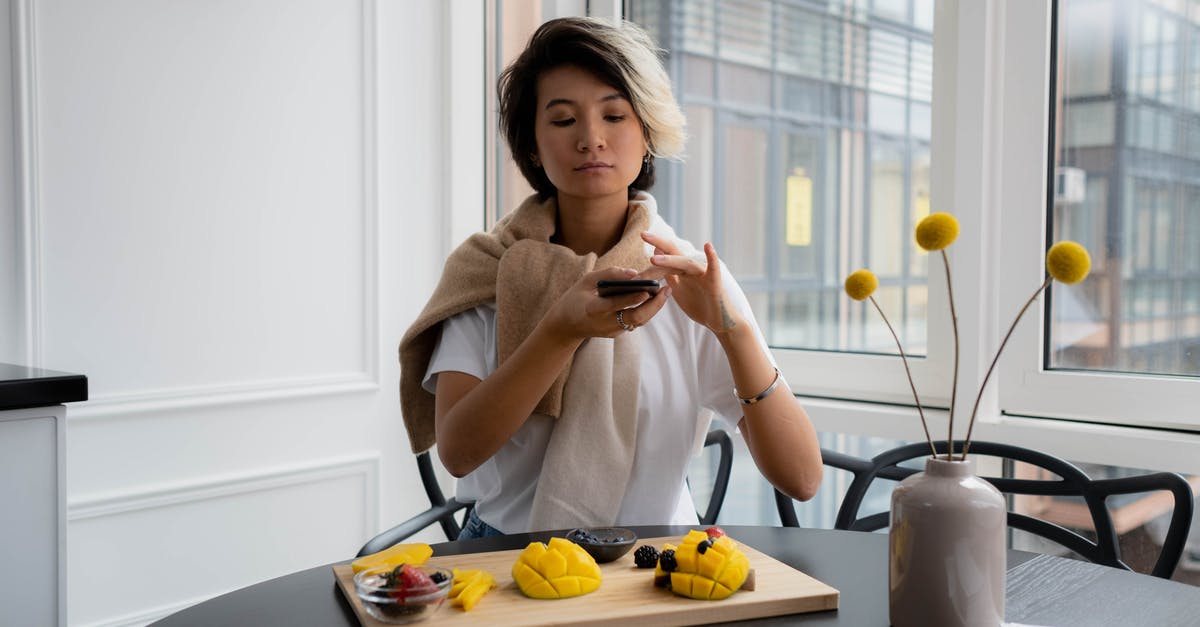 making iced tea with lowest caffeine content - Woman in White Shirt Sitting on Chair making iced tea with lowest caffeine content - Woman in White Shirt Sitting on Chair