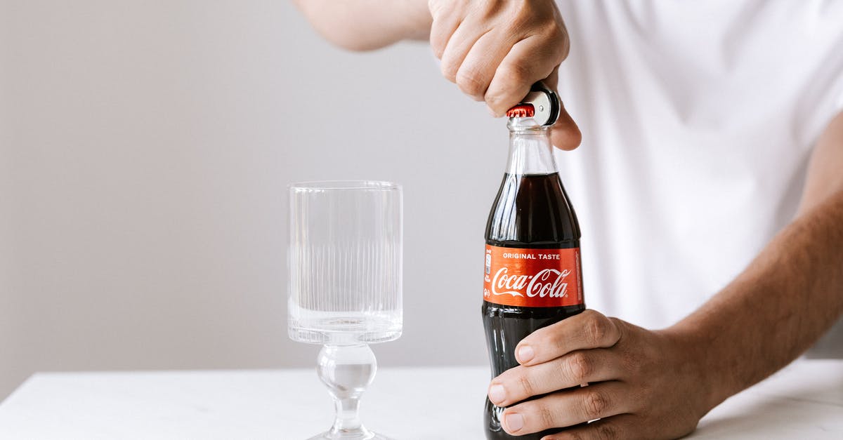 Making Pâté à bombe without sugar thermometer - Crop man opening glass bottle of cola Making Pâté à bombe without sugar thermometer - Crop man opening glass bottle of cola