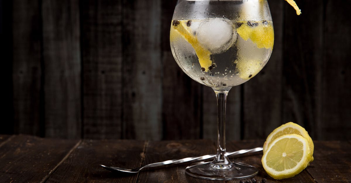 Making Pepper-Flavored Vodka - Lemonade on Brown Surface