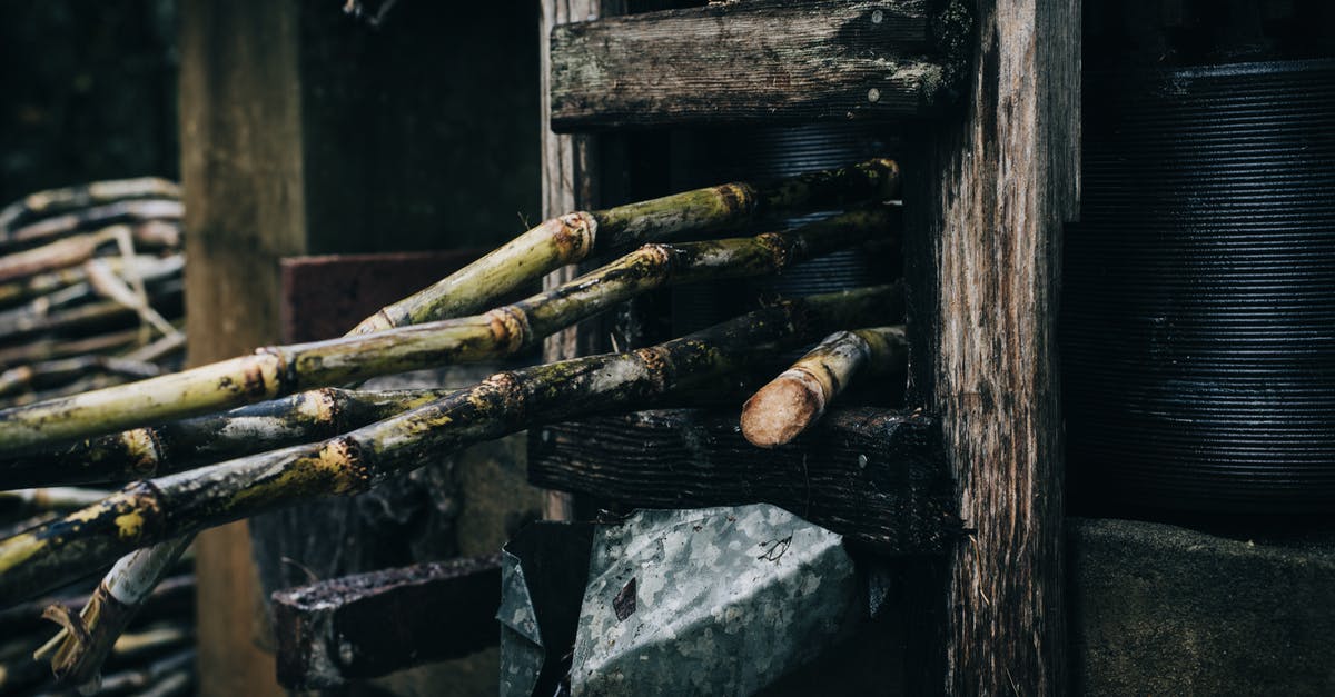 Making "long(er)-life" homemade mayonnaise - Sugar Canes Being Pressed in the Machine Making "long(er)-life" homemade mayonnaise - Sugar Canes Being Pressed in the Machine