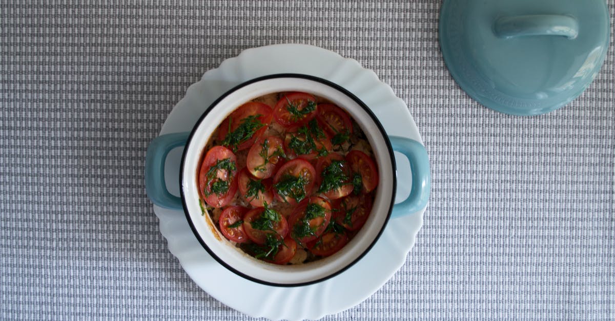 Marinate sundried tomatoes with ethanol overnight? - Red Sauce on White Ceramic Bowl Marinate sundried tomatoes with ethanol overnight? - Red Sauce on White Ceramic Bowl