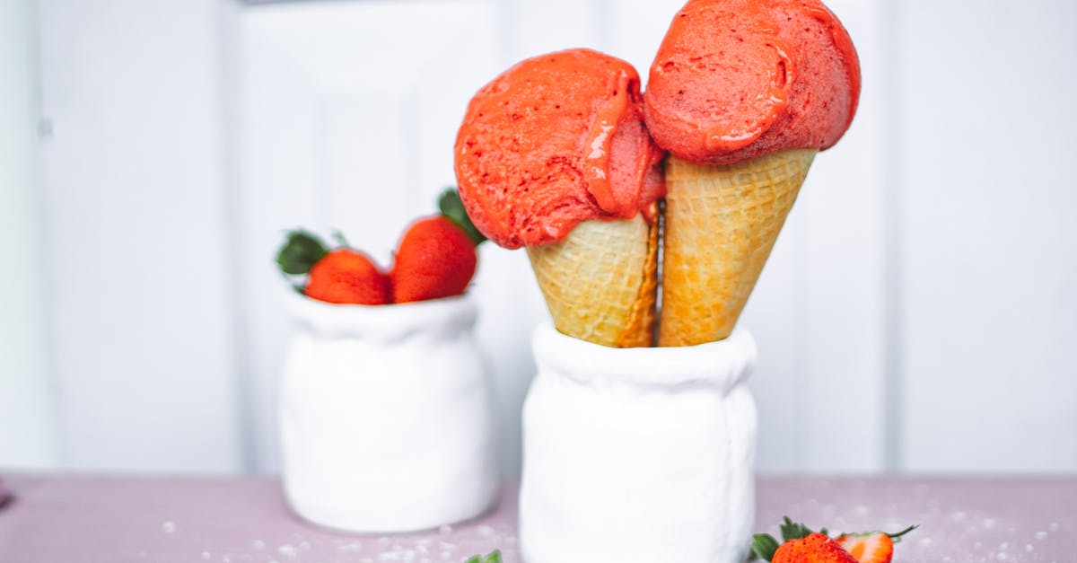 Marshmallow in cones becoming soggy - Cones of Strawberry Ice Cream in White Jar Marshmallow in cones becoming soggy - Cones of Strawberry Ice Cream in White Jar