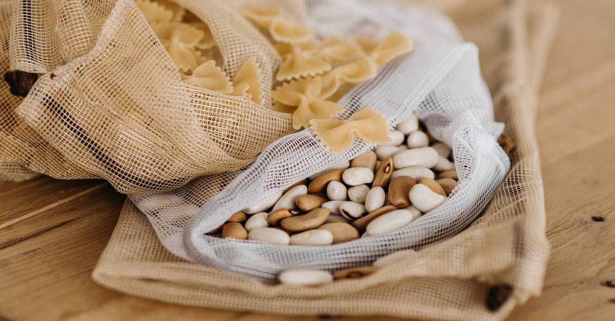 Masa Harina and a pasta roller? - White and Brown Stones on White Textile