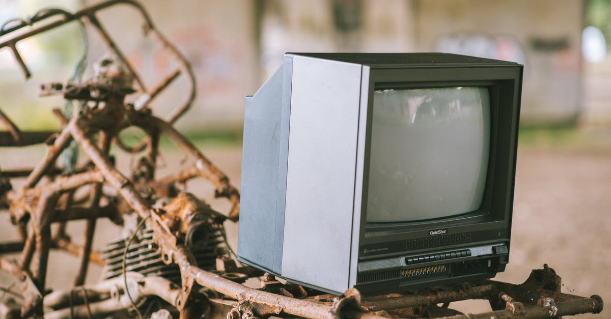 Material used for Portuguese custard tart molds - Retro TV set on rusty structure Material used for Portuguese custard tart molds - Retro TV set on rusty structure