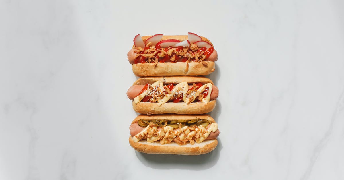 Mayonnaise advise - Photo of Hotdog Sandwiches on White Background Mayonnaise advise - Photo of Hotdog Sandwiches on White Background