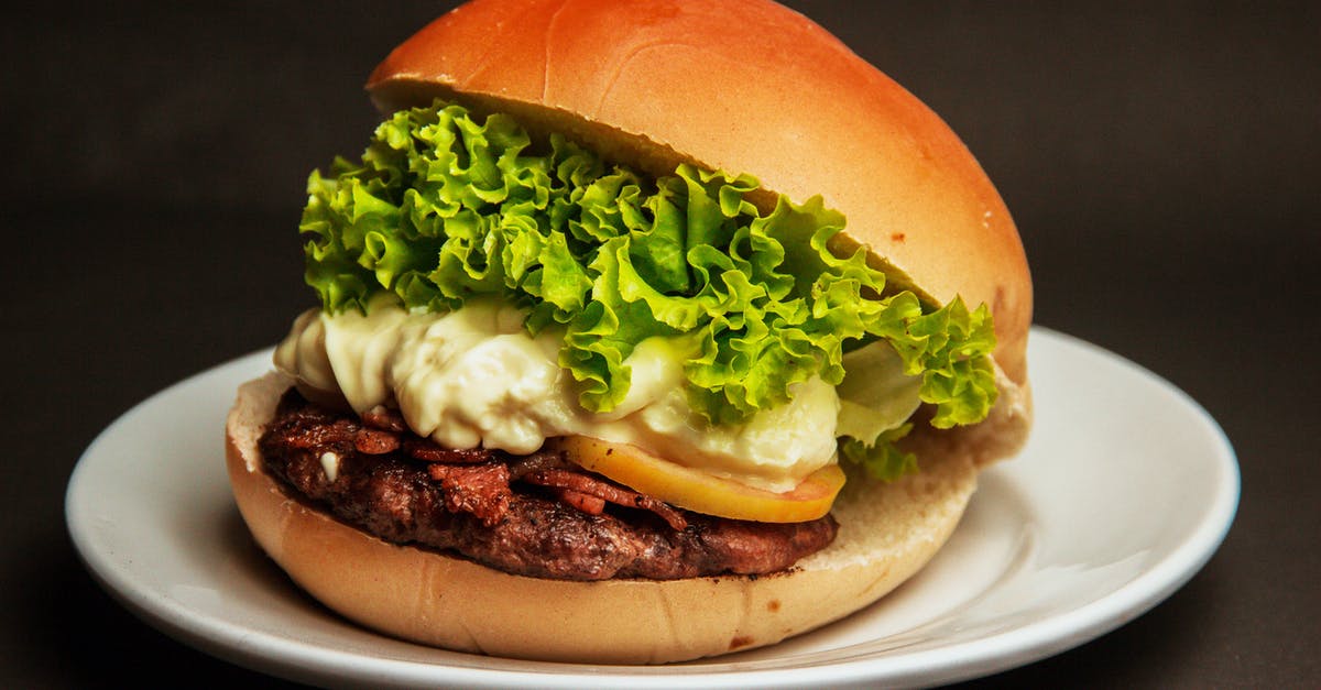 Mayonnaise Substitutes - Burger With Lettuce and Cheese on a White Plate Mayonnaise Substitutes - Burger With Lettuce and Cheese on a White Plate