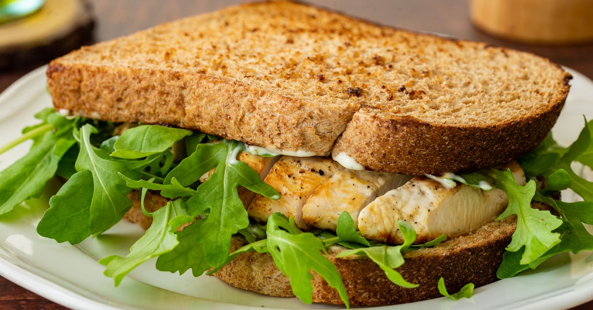 Mayonnaise versus chicken spread - Toasted Bread and Sliced Grilled Chicken with Mayonnaise Mayonnaise versus chicken spread - Toasted Bread and Sliced Grilled Chicken with Mayonnaise