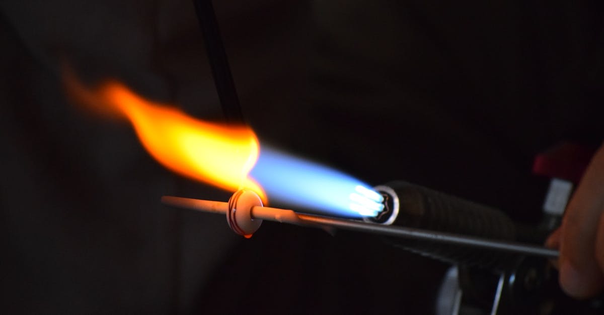 Melting sugar on creme brulee with blow torch - Light Torch Melting Metal Melting sugar on creme brulee with blow torch - Light Torch Melting Metal
