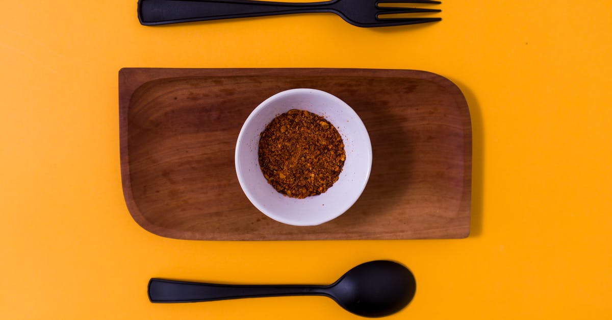Methods for seasoning wooden spoons? - Spicy Seasoning in White Bowl on Brown Wooden Platter Beside Spoon and Fork Methods for seasoning wooden spoons? - Spicy Seasoning in White Bowl on Brown Wooden Platter Beside Spoon and Fork