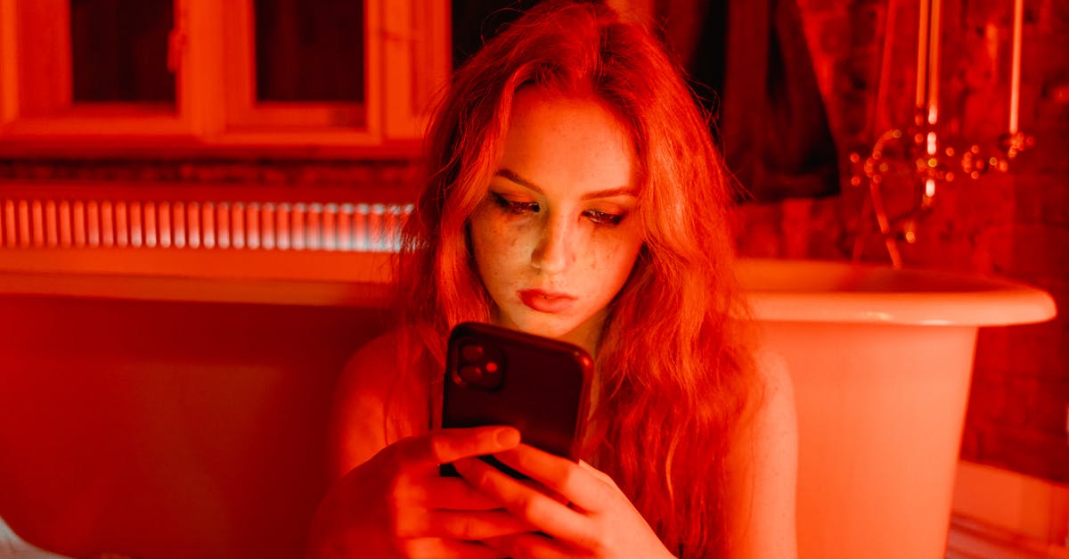 microwave use after cell phone heating - Woman with Smudge on Face Holding Cellphone microwave use after cell phone heating - Woman with Smudge on Face Holding Cellphone