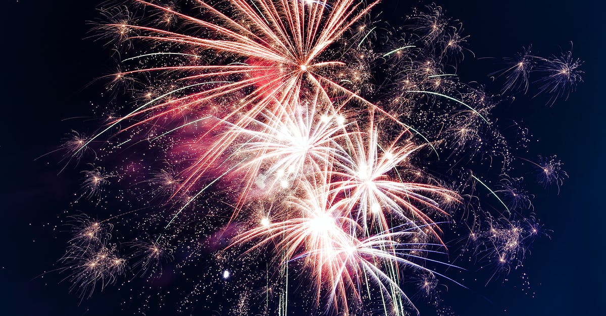 Microwaving M&Ms produces sparks - Low-angle Photo of Fireworks Microwaving M&Ms produces sparks - Low-angle Photo of Fireworks