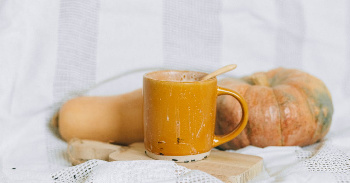 Milk temperature for white sauce - Yellow Ceramic Mug on White Textile Milk temperature for white sauce - Yellow Ceramic Mug on White Textile