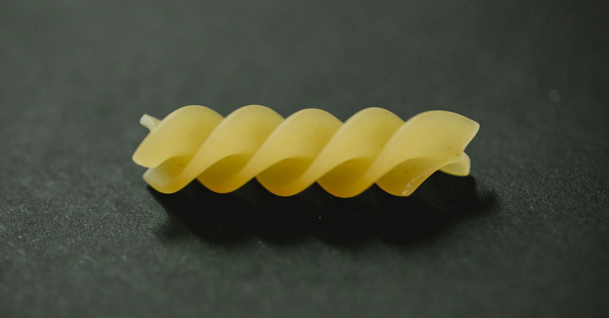 Minimal tasty preparation of raw chayote - Pice of fusilli pasta placed on table