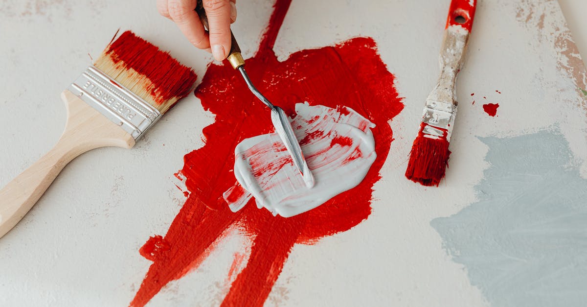 Mixing mozzarella without clumping - Person Holding Red Paint Brush Mixing mozzarella without clumping - Person Holding Red Paint Brush