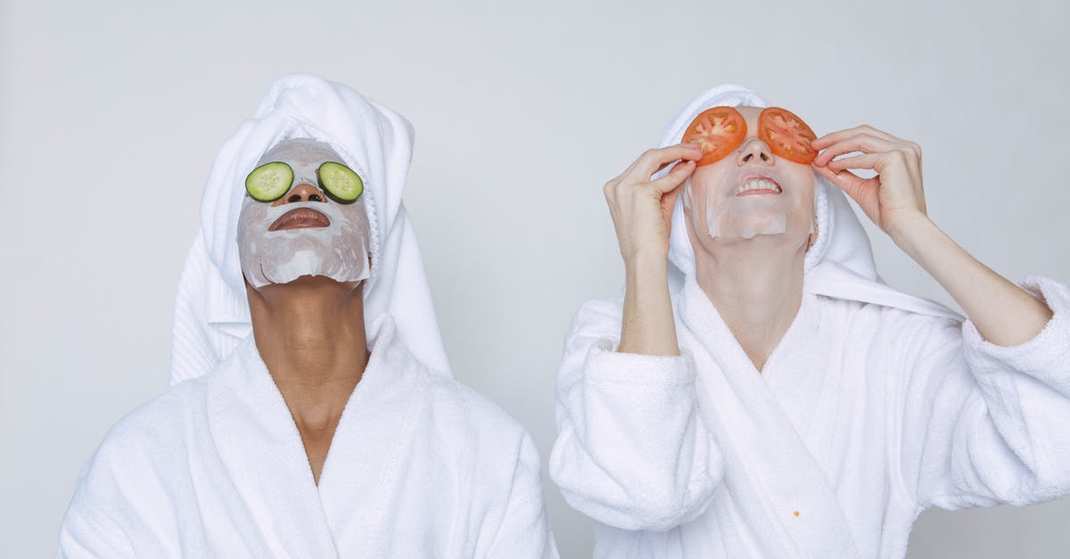 Moisture in Vegetable Bin - Young multiethnic females wearing bathrobes and towels moisturizing face with masks and slices of tomatoes and cucumbers against white background Moisture in Vegetable Bin - Young multiethnic females wearing bathrobes and towels moisturizing face with masks and slices of tomatoes and cucumbers against white background