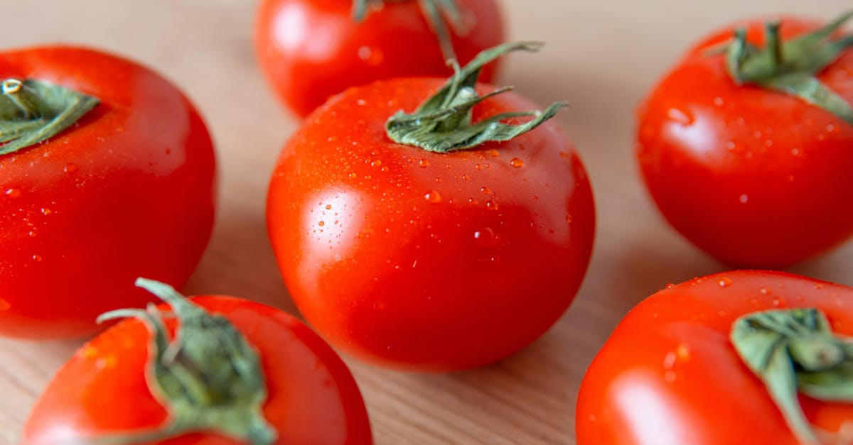 Moisture in Vegetable Bin - Close-Up Photo of Tomatoes Moisture in Vegetable Bin - Close-Up Photo of Tomatoes