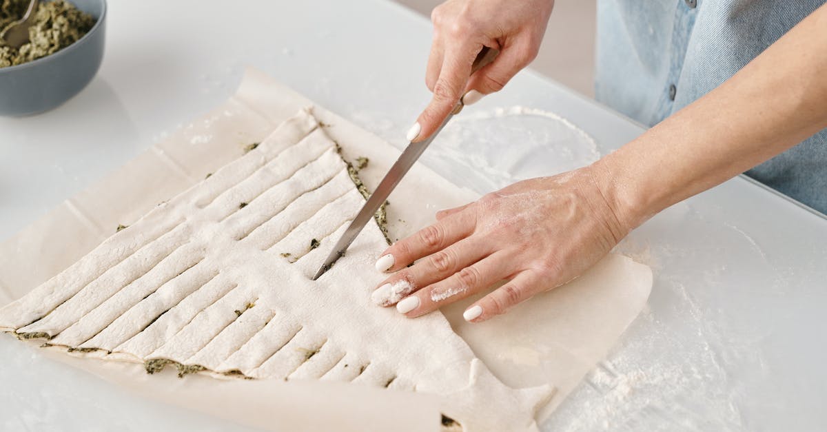 Mold on Canned Cherry pie filling - Person Slicing a Christmas Tree Shaped Bread With Fillings