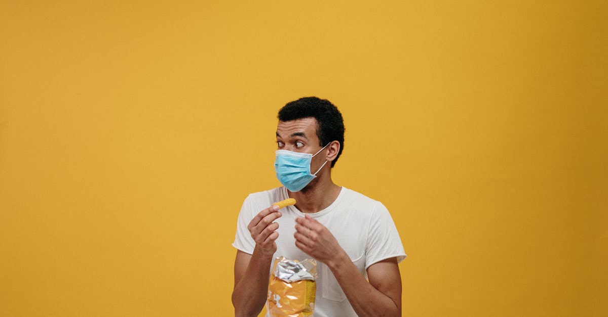 Mold on citrus: is it safe to eat? - Man in White Crew Neck T-shirt Eating Chips Mold on citrus: is it safe to eat? - Man in White Crew Neck T-shirt Eating Chips