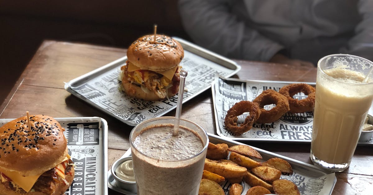 Mole sauce without chocolate? - Two Milk Shakes, Burgers, Fried Onion Rings and Wedge Potatoes on the Table