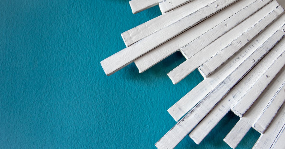 Muffin sticks to paper cases - White Wooden Blocks on Blue Surface Muffin sticks to paper cases - White Wooden Blocks on Blue Surface