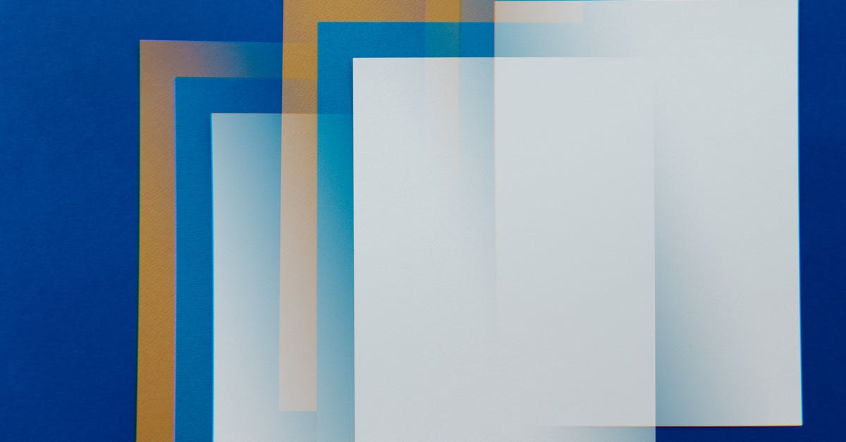 Multiple layer toasting in Microwave - White Paper on Blue and Yellow Textile Multiple layer toasting in Microwave - White Paper on Blue and Yellow Textile