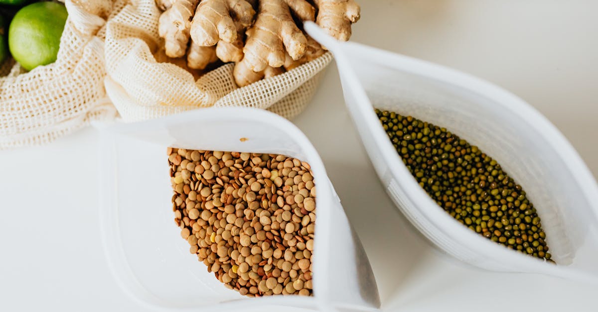 Mung beans take 10+ days to sprout - High Angle Shot of Cereal and Beans inside of White Plastic Mung beans take 10+ days to sprout - High Angle Shot of Cereal and Beans inside of White Plastic