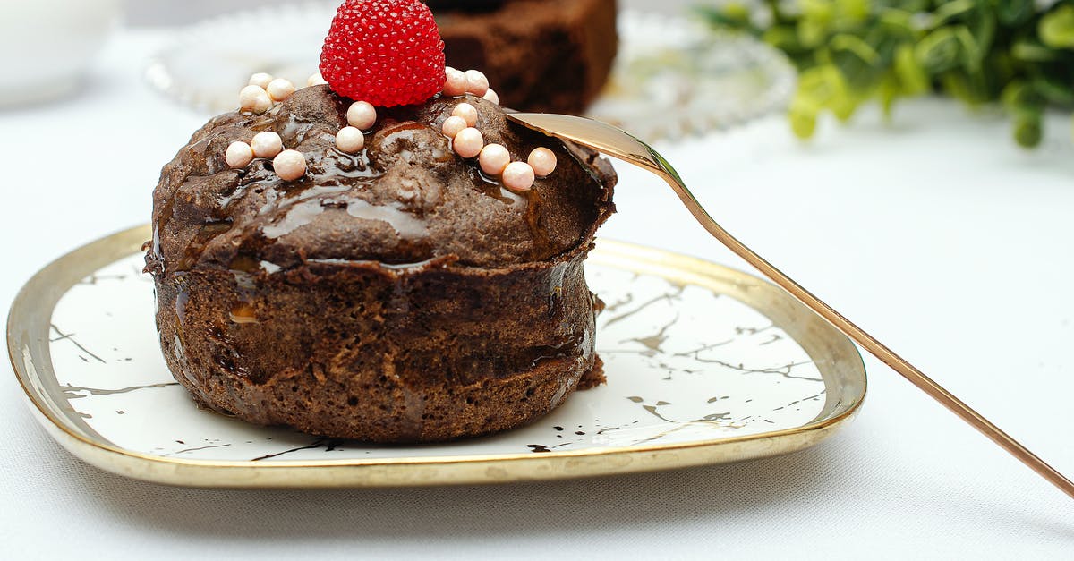 My cake is moist but crumbly - Chocolate Cake With Raspberry Toppings My cake is moist but crumbly - Chocolate Cake With Raspberry Toppings