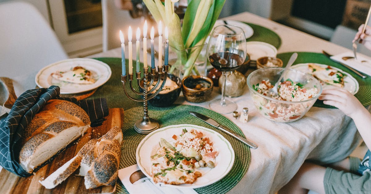 My Challah is bland - Hanukkah Meal on Dinner Table