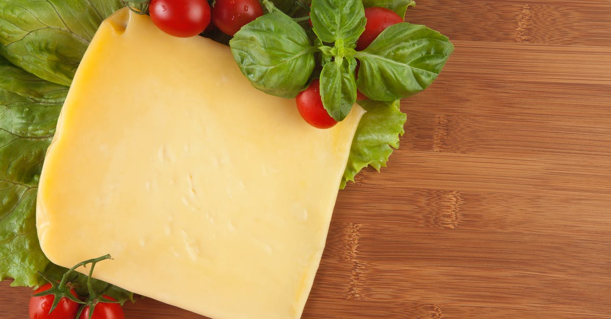 My cheese congealed and I don’t know why? - Red Cherry Tomatoes Beside Yellow Cheese My cheese congealed and I don’t know why? - Red Cherry Tomatoes Beside Yellow Cheese