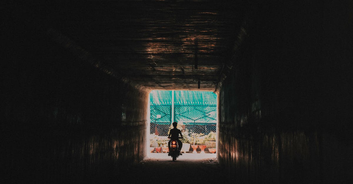 my chest freezer is going out. - Person Riding a Motorcycle Going out from the Tunnel my chest freezer is going out. - Person Riding a Motorcycle Going out from the Tunnel
