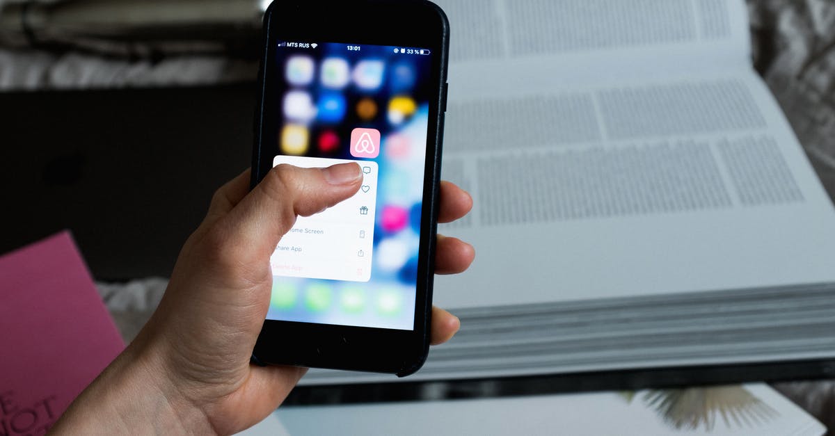 my freezer popped open without my knowlege - Crop unrecognizable person choosing application on smartphone my freezer popped open without my knowlege - Crop unrecognizable person choosing application on smartphone