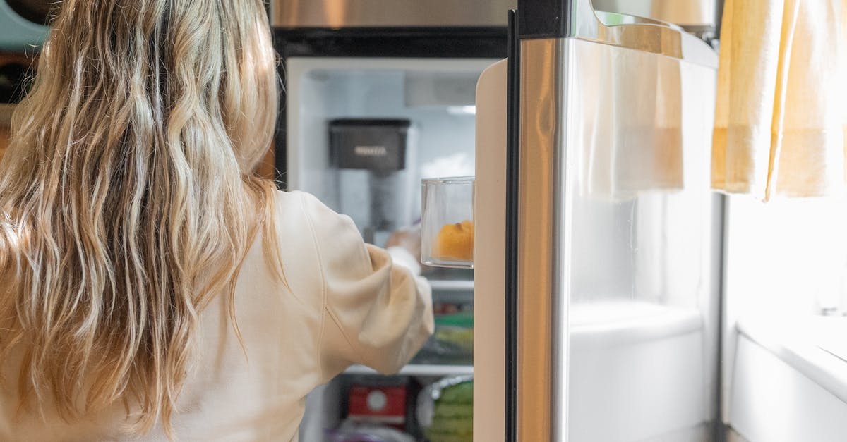 My jello is not getting firm in the refrigerator - Woman Getting Some Foods in the Refrigerator My jello is not getting firm in the refrigerator - Woman Getting Some Foods in the Refrigerator