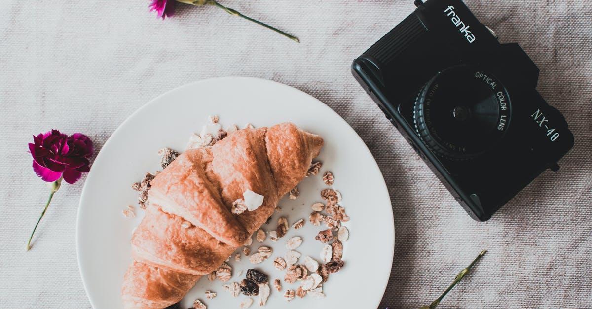 My oat bread is drier than the Sahara - Black Franka Dslr Camera Beside Croissant My oat bread is drier than the Sahara - Black Franka Dslr Camera Beside Croissant