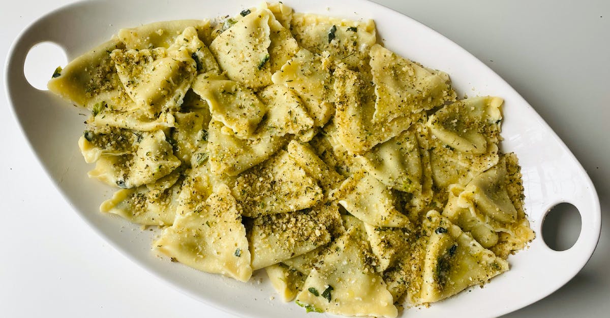 My pesto turned solid. Why? - Brown Food on White Ceramic Plate My pesto turned solid. Why? - Brown Food on White Ceramic Plate