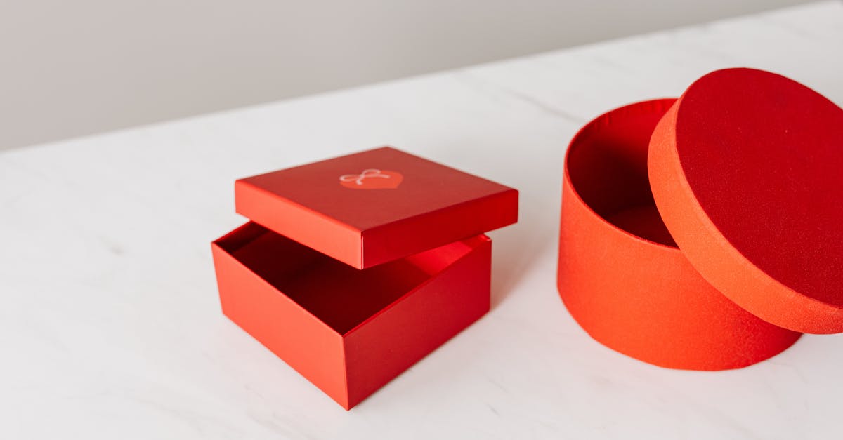 My Pineapple Open Tarts won't dislodge from their moulds - Different shapes red gift boxes on table My Pineapple Open Tarts won't dislodge from their moulds - Different shapes red gift boxes on table