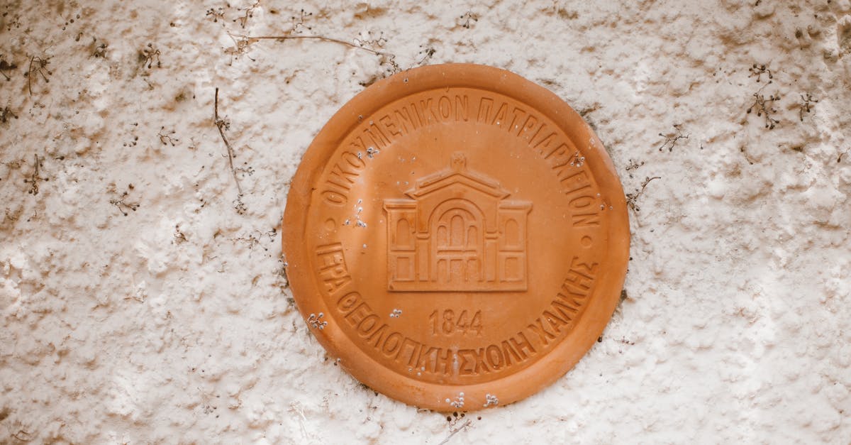 Name of a greek spice that sounds like "bakari" - Brown Round Plastic Lid on White Surface Name of a greek spice that sounds like "bakari" - Brown Round Plastic Lid on White Surface