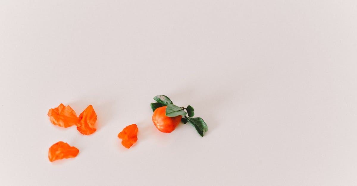 Name of a greek spice that sounds like "bakari" - Orange Flowers on White Surface Name of a greek spice that sounds like "bakari" - Orange Flowers on White Surface