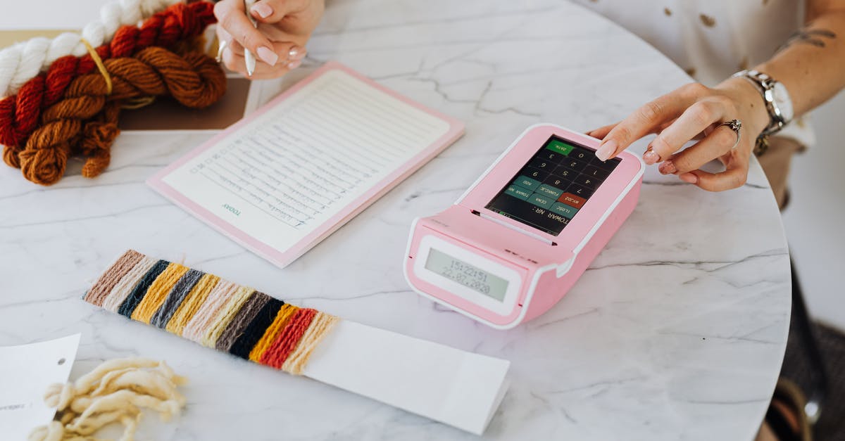 Need Binding agent ideas - Person Holding Pink and White Digital Device Need Binding agent ideas - Person Holding Pink and White Digital Device