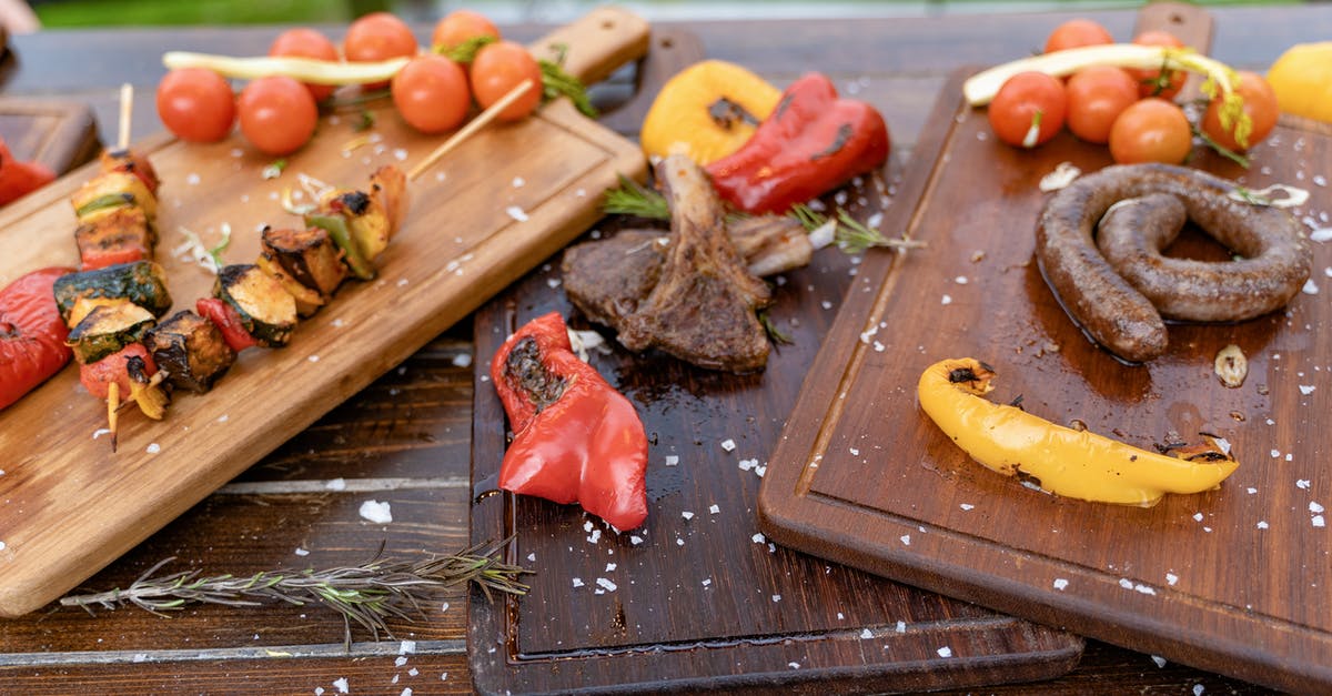 Need Help on Cooking Thick Pork Chops to Temperature - Close-Up Photo Of Meat On Wooden Chopping Board