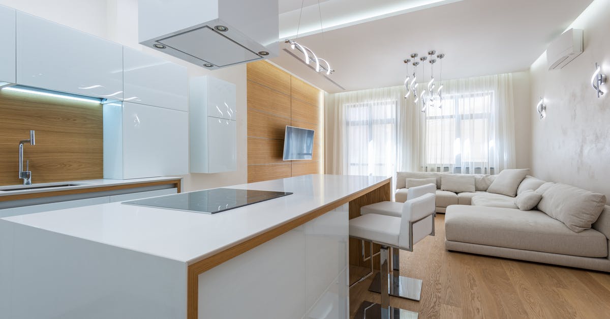 New crockpot cook times rule? - White kitchen counter with stove placed in kitchen zone against living room in contemporary apartment New crockpot cook times rule? - White kitchen counter with stove placed in kitchen zone against living room in contemporary apartment