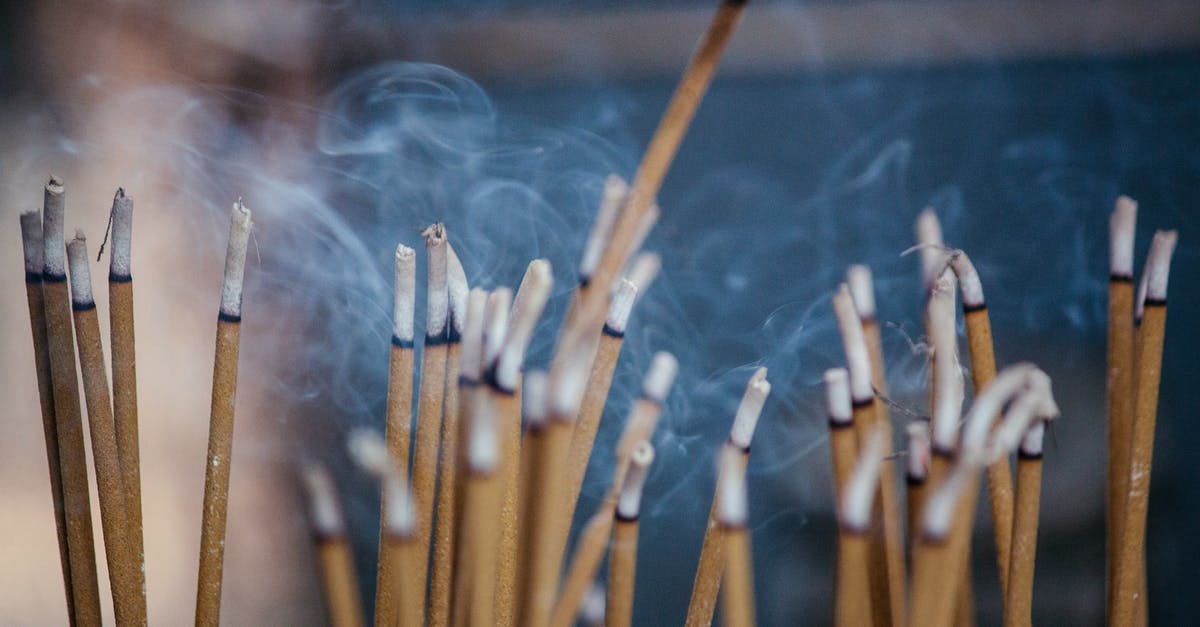No lower heating element - Various types of smoldering aroma sticks with smoke on stand in cozy apartment No lower heating element - Various types of smoldering aroma sticks with smoke on stand in cozy apartment