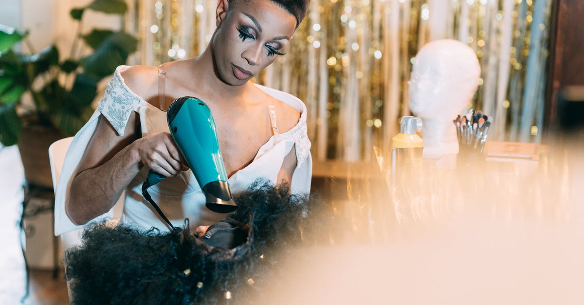 Non-dairy creamer, dry - Drag queen in dress drying wig Non-dairy creamer, dry - Drag queen in dress drying wig