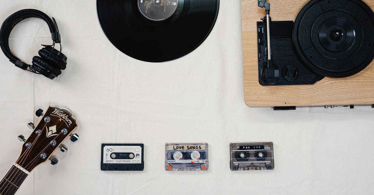 Non-plastics storage suggestions - Black Vinyl Record on White Table Non-plastics storage suggestions - Black Vinyl Record on White Table