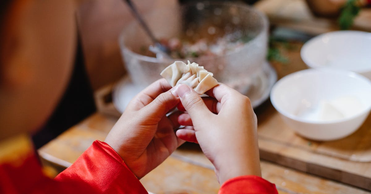 Nutrient content of ground bison meat - High angle of crop anonymous boy cooking dumplings with dough and ground meat for traditional Chinese lunch Nutrient content of ground bison meat - High angle of crop anonymous boy cooking dumplings with dough and ground meat for traditional Chinese lunch