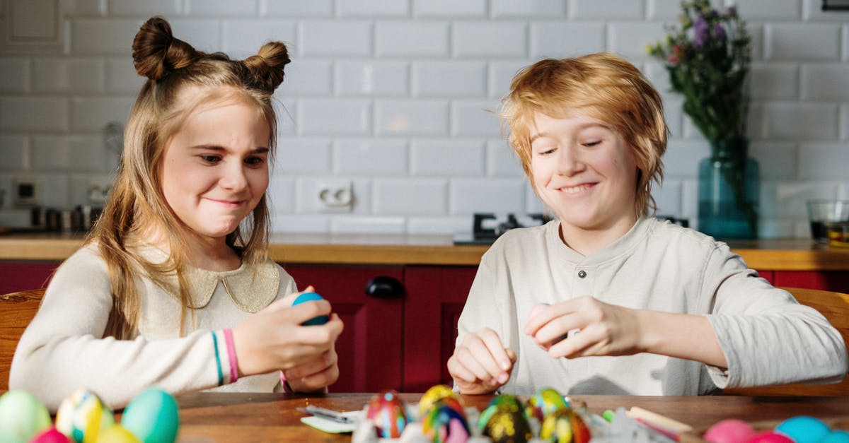 Once unwashed eggs have been refrigerated, must they remain so? - Kids Playing with Easter Eggs