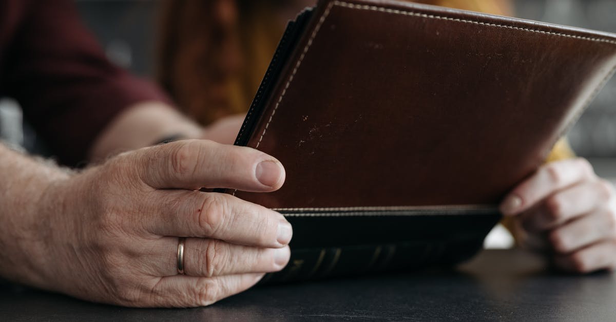 Open turkeys too soon - Person Holding Brown Leather Bifold Wallet Open turkeys too soon - Person Holding Brown Leather Bifold Wallet