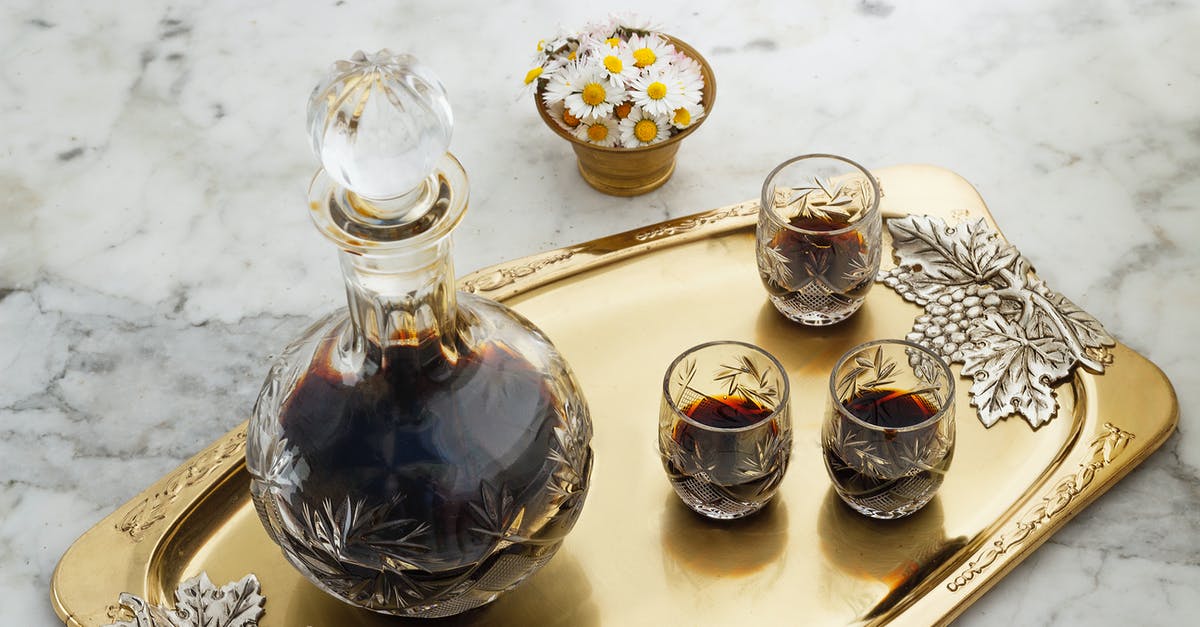 Optimal type of wine bottle opener? - Clear Glass Pitcher with Brown Liquid on Golden Tray Optimal type of wine bottle opener? - Clear Glass Pitcher with Brown Liquid on Golden Tray