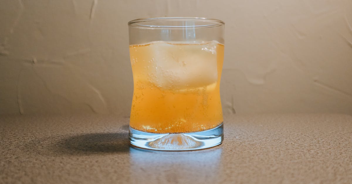 Orange juice preservation by chemical presevatives - Clear Drinking Glass With Brown Liquid Orange juice preservation by chemical presevatives - Clear Drinking Glass With Brown Liquid