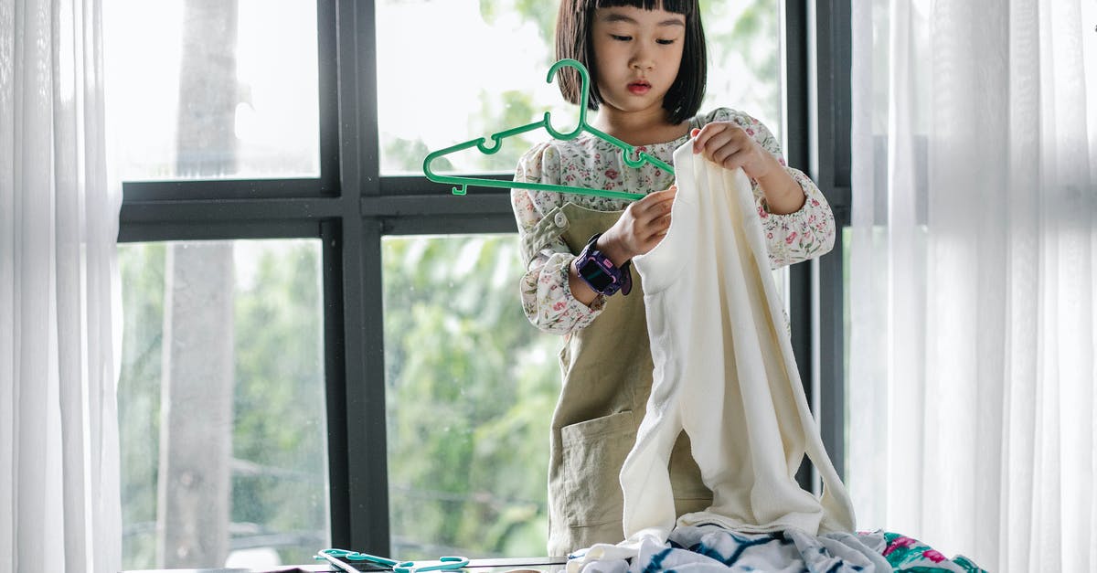 oven cleaning help and tips - Little girl doing housework in room oven cleaning help and tips - Little girl doing housework in room